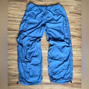 Baggy nylon pants in dark grey.